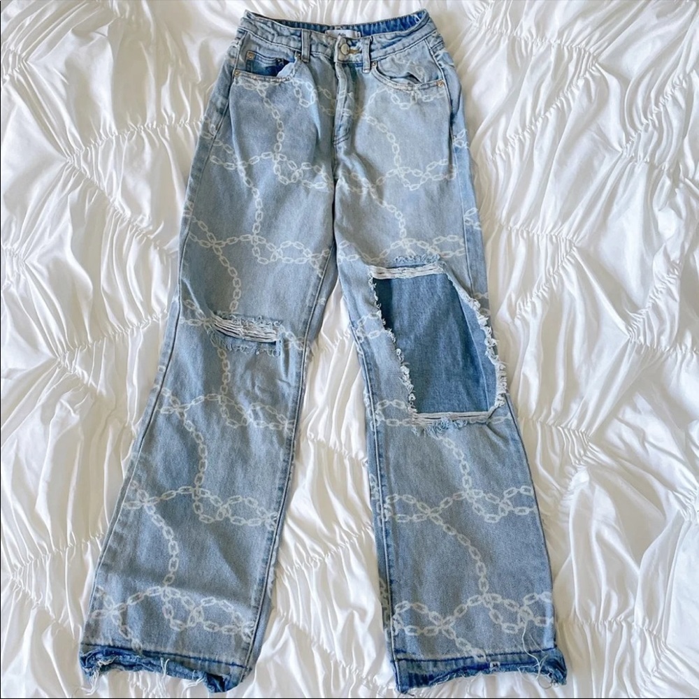 adika chain print distressed jeans
